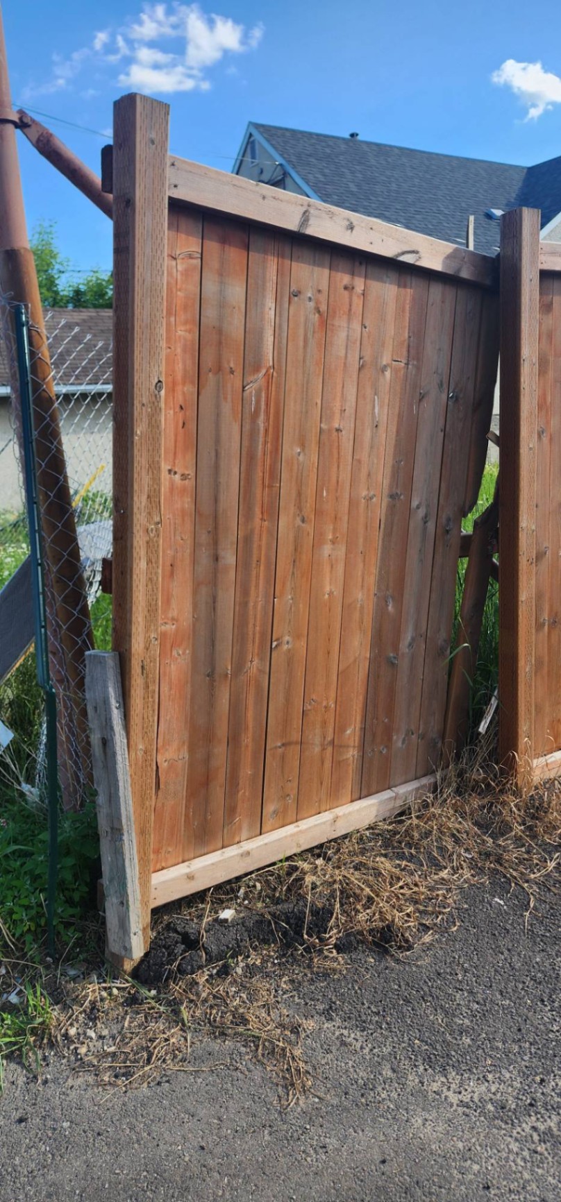 Customer-submitted photo of a failing fence estimated at 3–7 years old (example 6)