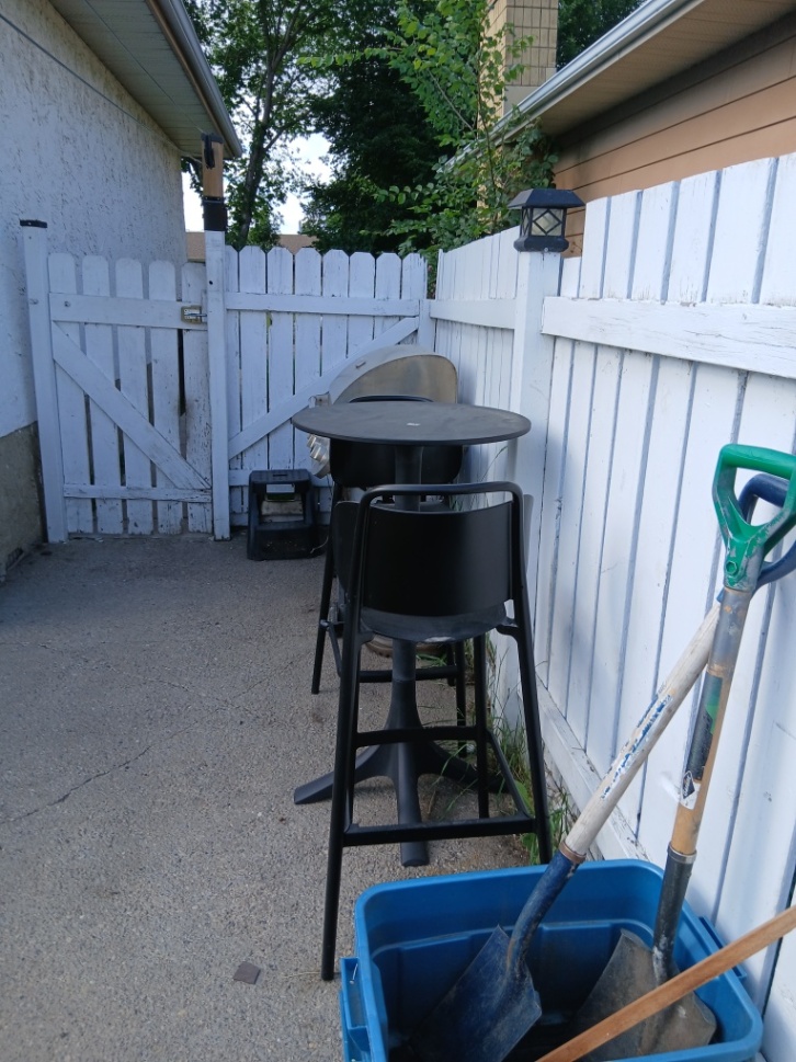 Customer-submitted photo of a failing fence estimated at 15+ years old (example 9)