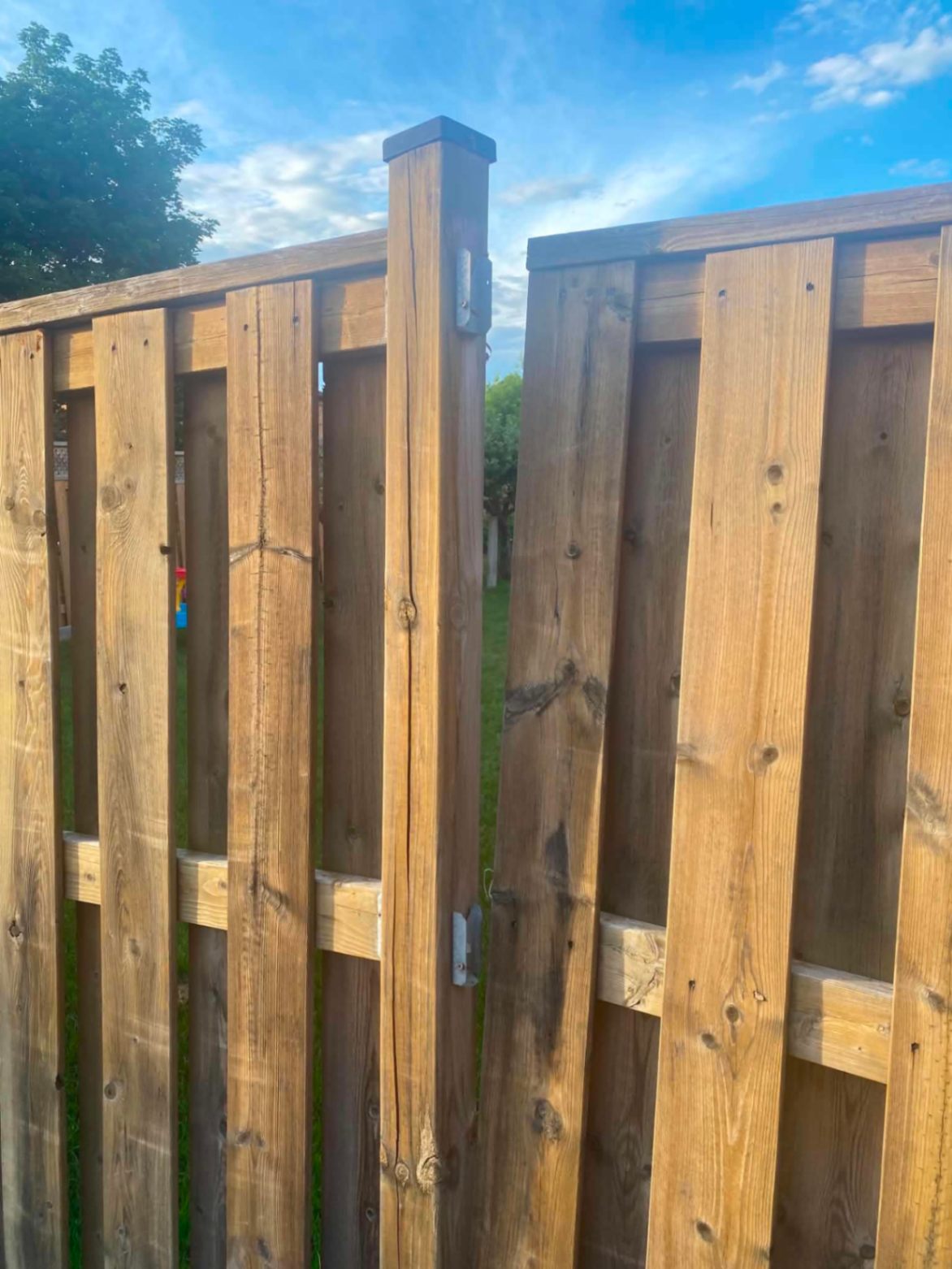 Customer-submitted photo of a failing fence estimated at 3–7 years old (example 8)