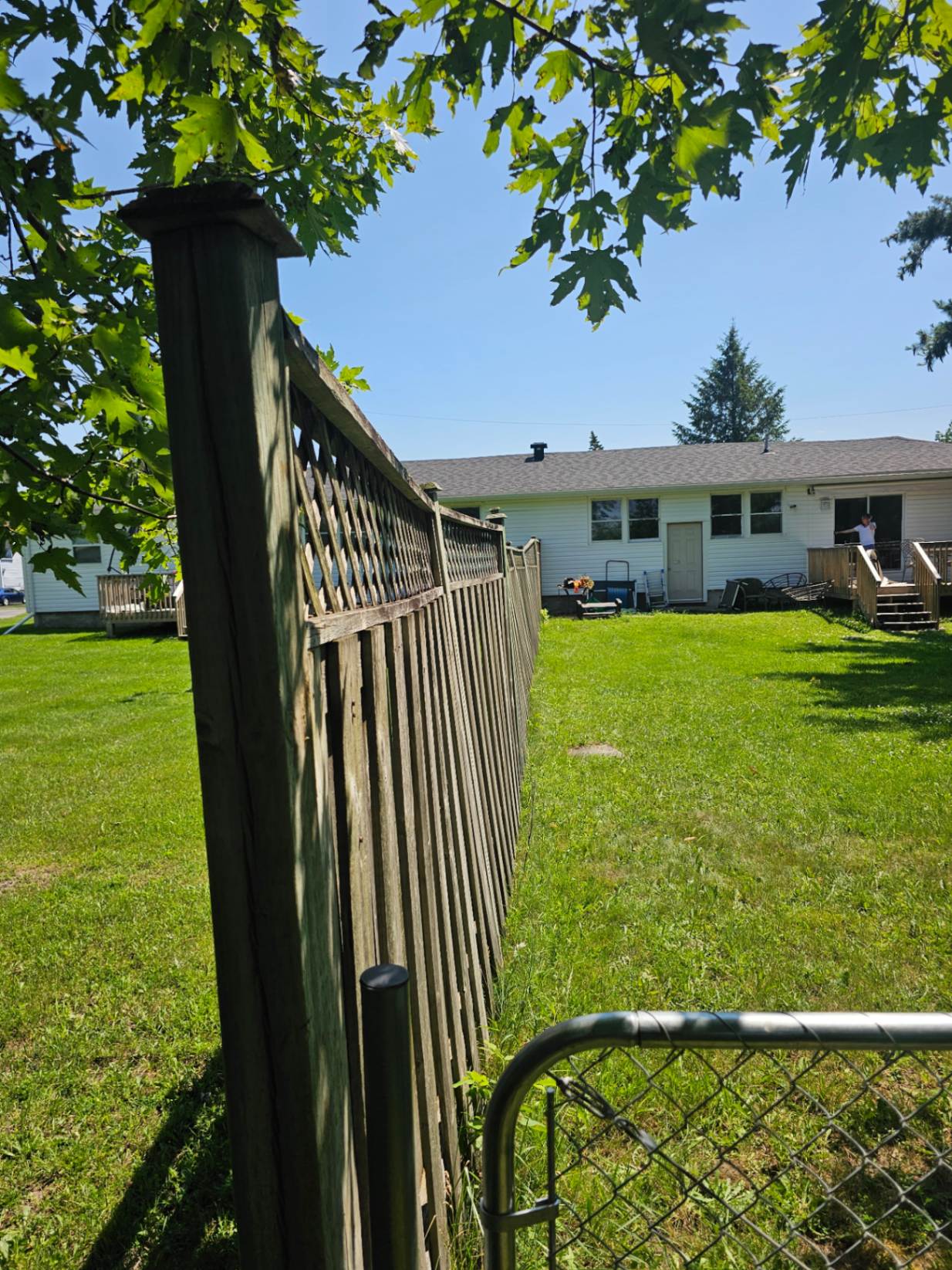 Customer-submitted photo of a failing fence estimated at 8–15 years old (example 3)