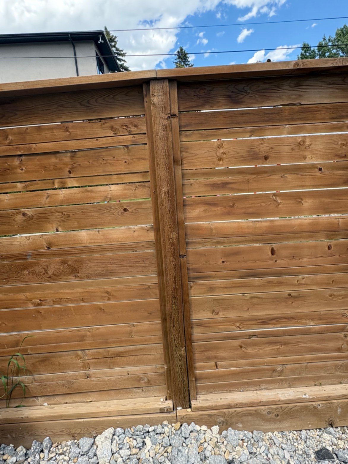 Customer-submitted photo of a failing fence estimated at 3–7 years old (example 2)