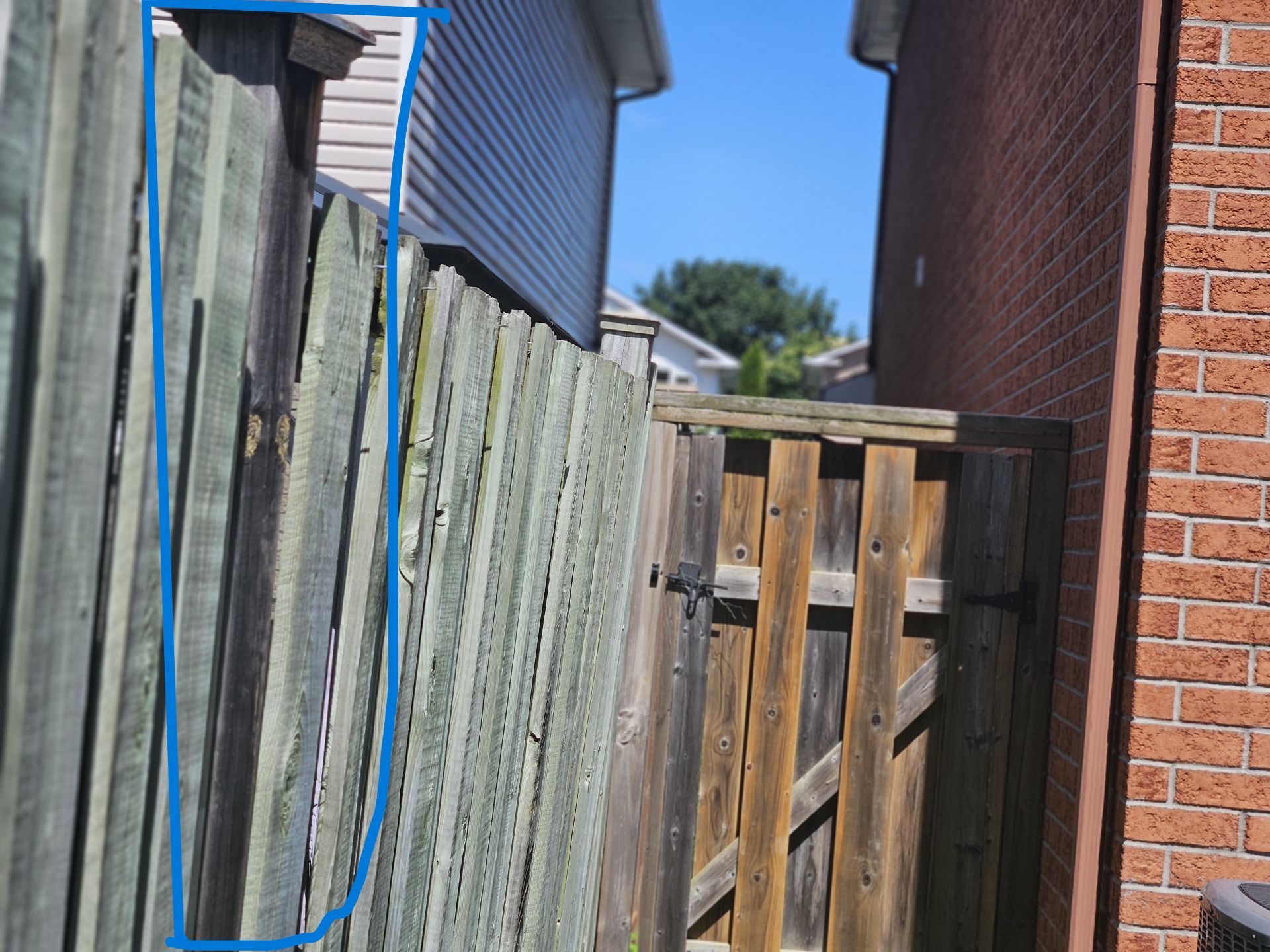 Customer-submitted photo of a failing fence estimated at 8–15 years old (example 6)
